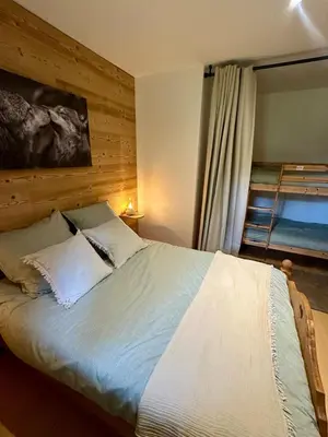 Un ou plusieurs lits dans un hébergement de l'établissement Lakeside - Appartement cosy au bord du lac