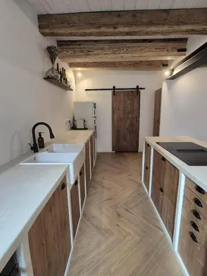 Cuisine ou kitchenette dans l'établissement La Lanterne