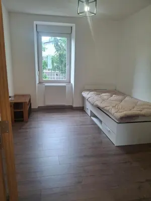 Un ou plusieurs lits dans un hébergement de l'établissement Appartement T3 neuf