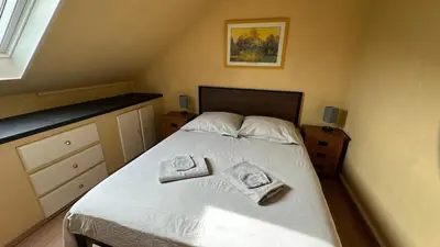 Un ou plusieurs lits dans un hébergement de l'établissement Maison alsacienne cosy avec parking privé, à deux pas du marché de Noël de Kaysersberg - 6 guests