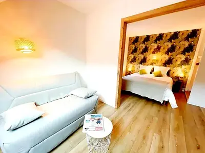 Un ou plusieurs lits dans un hébergement de l'établissement Domaine de la Papeterie, Chambres d'hôtes-GR5-Hexatrek