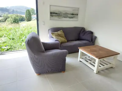 Coin salon dans l'établissement Modern Vosges Getaway