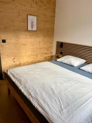 Un ou plusieurs lits dans un hébergement de l'établissement Chalet Iris, spa privatif, 4p