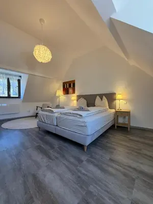 Un ou plusieurs lits dans un hébergement de l'établissement Maison Bleue, Appartements Thann centre, proche vignoble, terrasse avec vue