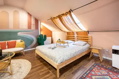 Un ou plusieurs lits dans un hébergement de l'établissement Casa del Sol - Jacuzzi & Boho Elegance