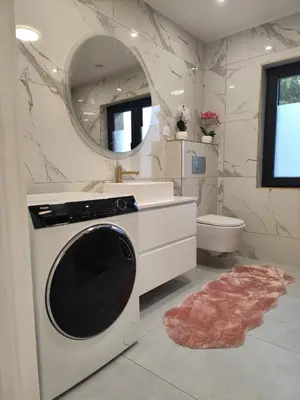 Salle de bains dans l'établissement Appartement meublé Rixheim Alsace