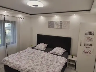 Un ou plusieurs lits dans un hébergement de l'établissement Appartement meublé Rixheim Alsace