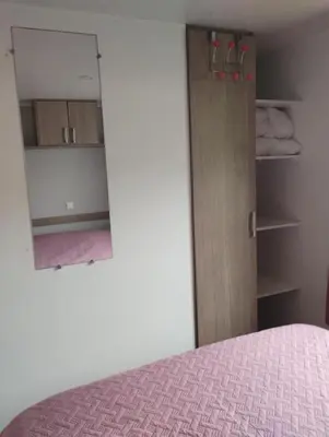 Un ou plusieurs lits dans un hébergement de l'établissement Mobilhomme munster
