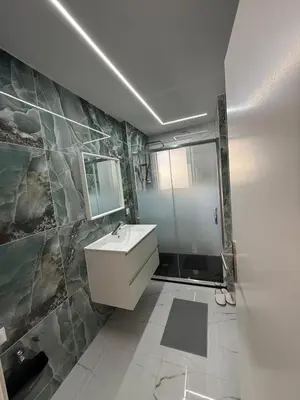 Salle de bains dans l'établissement Appartement Lumière