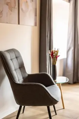 Coin salon dans l'établissement Les 4 Fontaines