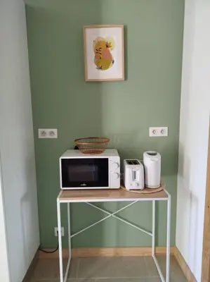 Cuisine ou kitchenette dans l'établissement Duplex- La Medelle