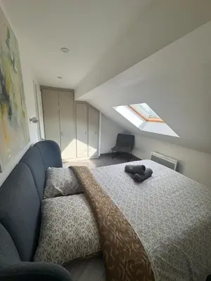 Un ou plusieurs lits dans un hébergement de l'établissement Appartement cosy au centre ville de Colmar