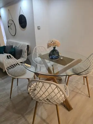 Coin salon dans l'établissement appartement en sous sol