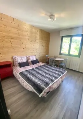 Un ou plusieurs lits dans un hébergement de l'établissement Studio à Gérardmer, les Dryades