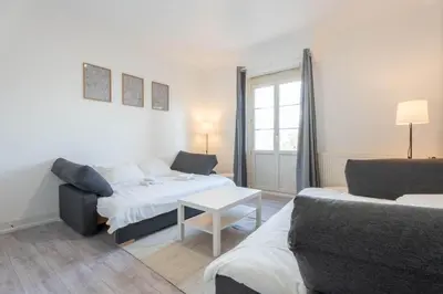 Un ou plusieurs lits dans un hébergement de l'établissement Magnifique Appartement Mulhouse Stationnement Gratuit