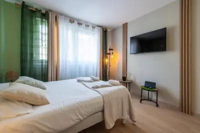 Un ou plusieurs lits dans un hébergement de l'établissement Magnifique Studio Mulhouse Centre