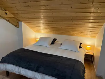 Un ou plusieurs lits dans un hébergement de l'établissement Le Chalet des Vosges