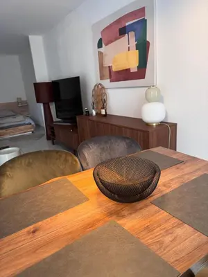 Télévision ou salle de divertissement dans l'établissement Le K Home du kaligone