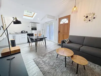 Cuisine ou kitchenette dans l'établissement Le Jardin Secret Apartment
