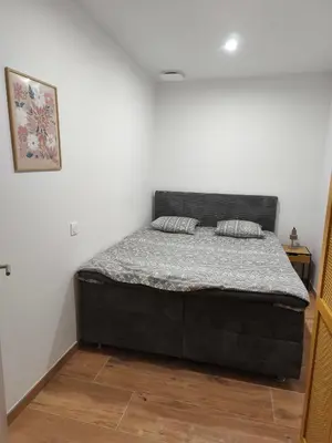 Un ou plusieurs lits dans un hébergement de l'établissement Gite Secret Spa Colmar - 5 pers - jacuzzi - 70m2 - 2 chambres séparés