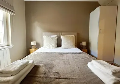 Un ou plusieurs lits dans un hébergement de l'établissement Moka - Élégant appartement 2 chambres à Colmar