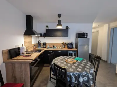 Cuisine ou kitchenette dans l'établissement Appartement cocooning au cœur des Hautes-Vosges avec terrasse et parking privé - FR-1-589-841