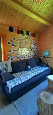 Coin salon dans l'établissement Chalet L' Aventurière