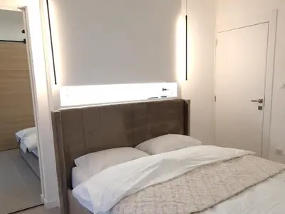 Un ou plusieurs lits dans un hébergement de l'établissement Modern Comfort for 6 Guests 3 Bedrooms Home near Colmar