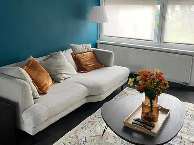Coin salon dans l'établissement Cozy house with garden