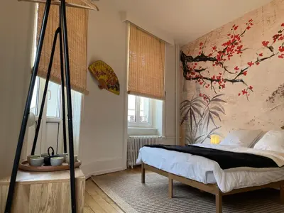 Un ou plusieurs lits dans un hébergement de l'établissement L'echappée Belfortaine - Appartement Belfort, 1 chambre Sauna proche Technhom