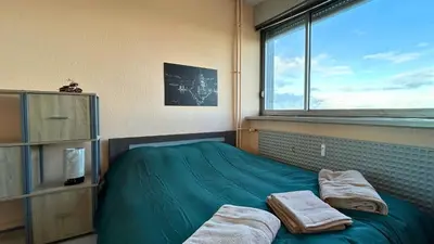 Un ou plusieurs lits dans un hébergement de l'établissement Le Panorama Mulhouse