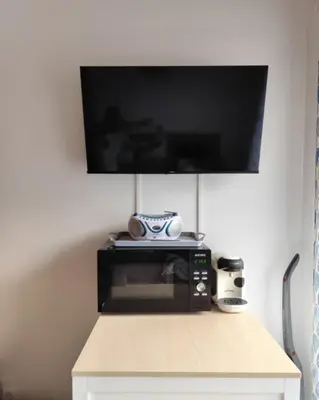 Télévision ou salle de divertissement dans l'établissement Duplex Télémark