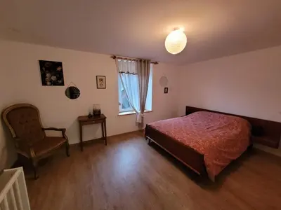 Un ou plusieurs lits dans un hébergement de l'établissement Gîte cosy dans les Vosges