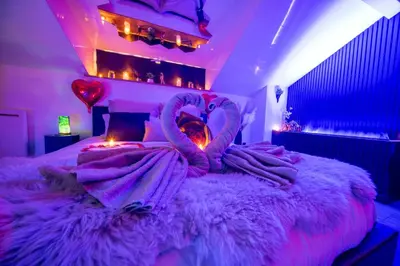Un ou plusieurs lits dans un hébergement de l'établissement Love Room Serenity Suite