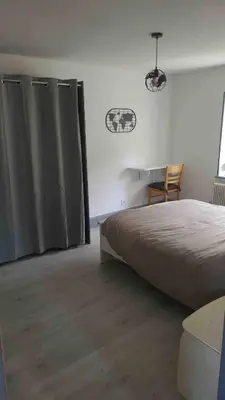 Un ou plusieurs lits dans un hébergement de l'établissement Appartement cosy rénové au calme