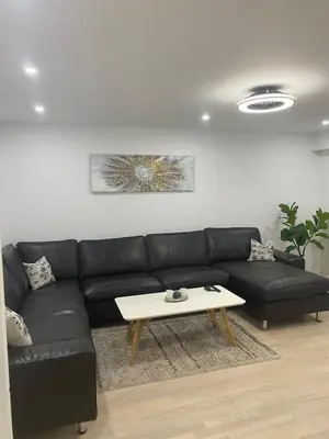Coin salon dans l'établissement Cozy apartment near Basel Airport