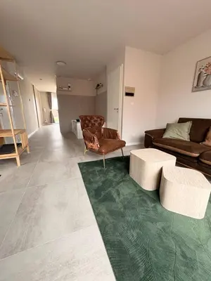 Coin salon dans l'établissement Maison MUGUET 3 SPA-PARKING-COLMAR