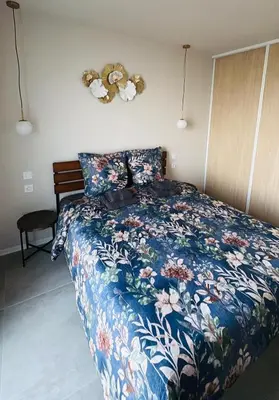 Un ou plusieurs lits dans un hébergement de l'établissement Maison MUGUET 4 SPA-PARKING-COLMAR