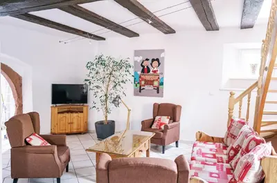 Coin salon dans l'établissement Les Gîtes de la Mère Michèle
