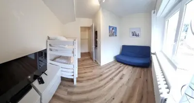 Un ou plusieurs lits dans un hébergement de l'établissement Appart 1er Etage - 90 m plein centre-ville !