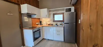 Cuisine ou kitchenette dans l'établissement Chalet du Feignole