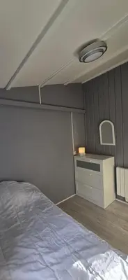 Un ou plusieurs lits dans un hébergement de l'établissement Chalet du Feignole