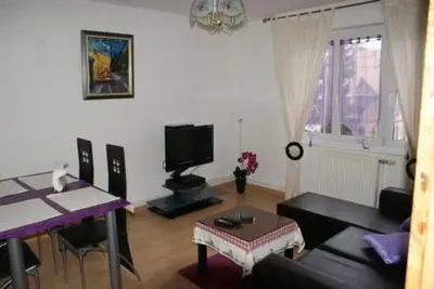 Télévision ou salle de divertissement dans l'établissement Papito