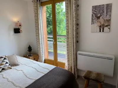 Un ou plusieurs lits dans un hébergement de l'établissement Chalet cosy en pleine nature proche Gérardmer