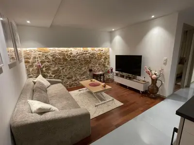 Télévision ou salle de divertissement dans l'établissement Les Rives du vignoble