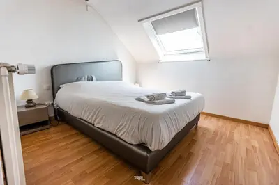 Un ou plusieurs lits dans un hébergement de l'établissement Beautiful apartment close to Basel with parking