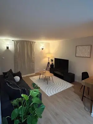 Télévision ou salle de divertissement dans l'établissement Au Secret du Ladhof