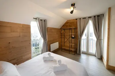 Un ou plusieurs lits dans un hébergement de l'établissement Maison cosy rénovée, cœur de Gérardmer proche lac
