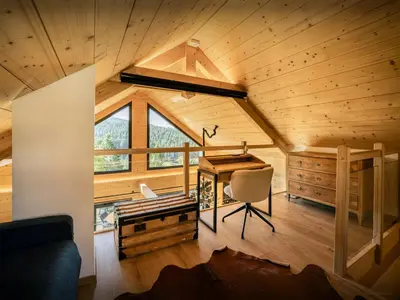 Coin salon dans l'établissement Chalet L'Ursus - OVO Network