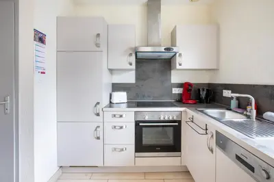 Cuisine ou kitchenette dans l'établissement Appartement agréable proche Colmar